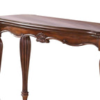 Table basse en bois sculpté, brun cerise
